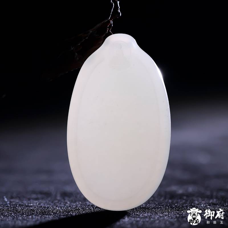 Finished gold-skin Hetian jade plaque photographed for its material record