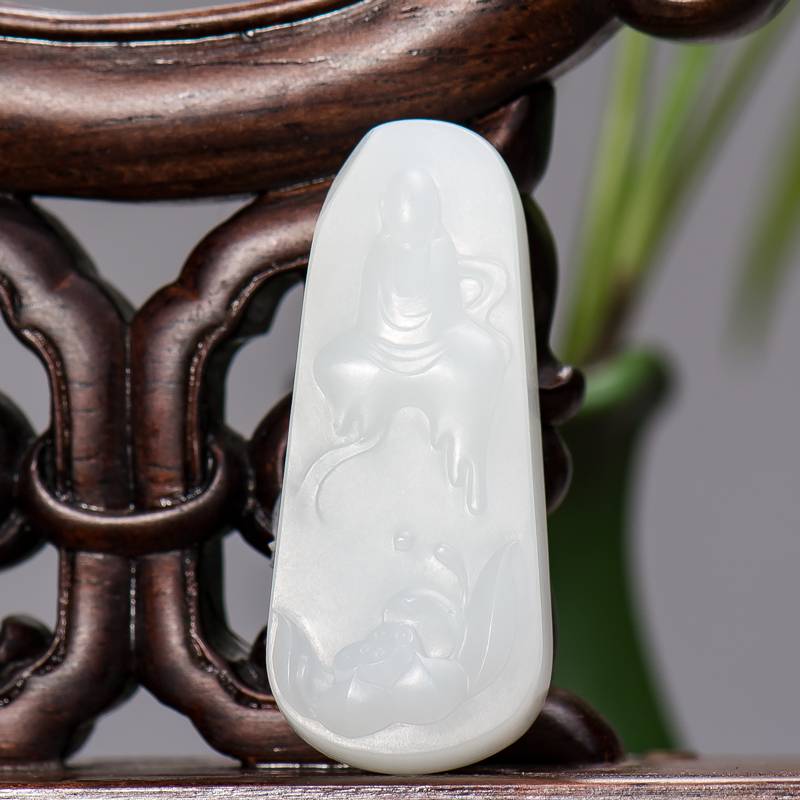 Front view of a Xinjiang lamb-fat white Hetian jade wudao lotus plaque